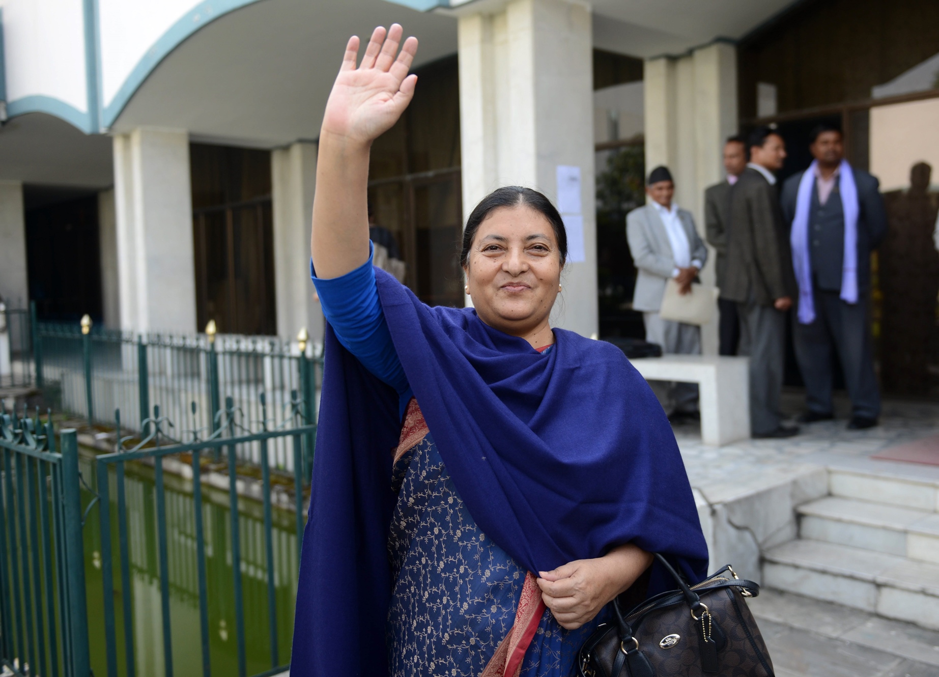 bidhya bhandari waves after casting her vote in an election for nepal 039 s new president in kathmandu on october 28 2015 photo afp