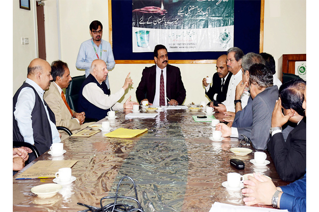 a delegation led by pakistan tehreek i insaf s provincial organiser chaudhry sarwar met the provincial election commissioner maqsood ahmed malik photo nni