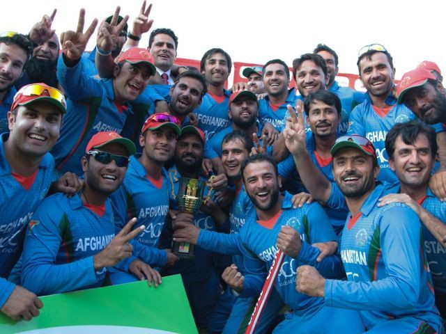afghanistan 039 s players pose with the series trophy after they won the fifth and final one day international odi cricket match against zimbabwe at the queens sports club in bulawyo on october 24 2015 photo afp afghanistan 039 s players pose with the series trophy after they won the fifth and final one day international odi cricket match against zimbabwe at the queens sports club in bulawyo on october 24 2015 photo afp