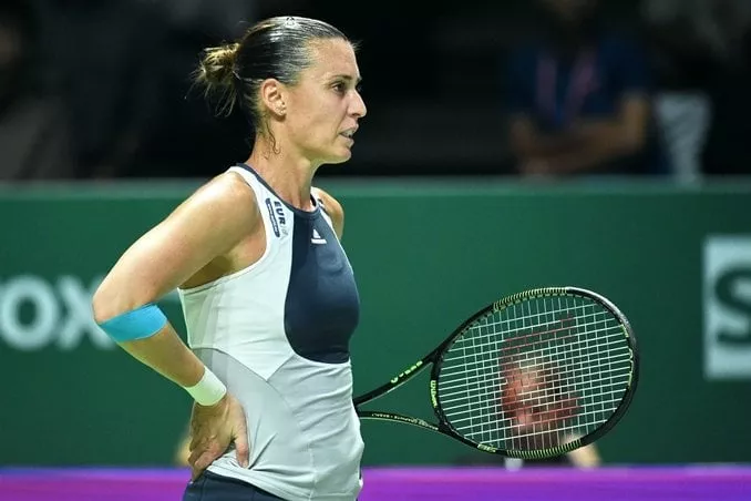 italy 039 s flavia pennetta reacts after a point against russia 039 s maria sharapova during their women 039 s singles round robin tennis match at the wta finals in singapore on october 29 2015 photo afp italy 039 s flavia pennetta reacts after a point against russia 039 s maria sharapova during their women 039 s singles round robin tennis match at the wta finals in singapore on october 29 2015 photo afp
