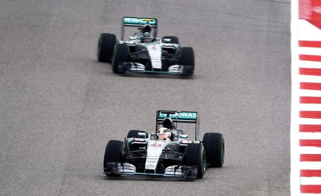 hamilton and rosberg clashed on lap one before the briton secured a bold title clinching triumph photo afp hamilton and rosberg clashed on lap one before the briton secured a bold title clinching triumph photo afp
