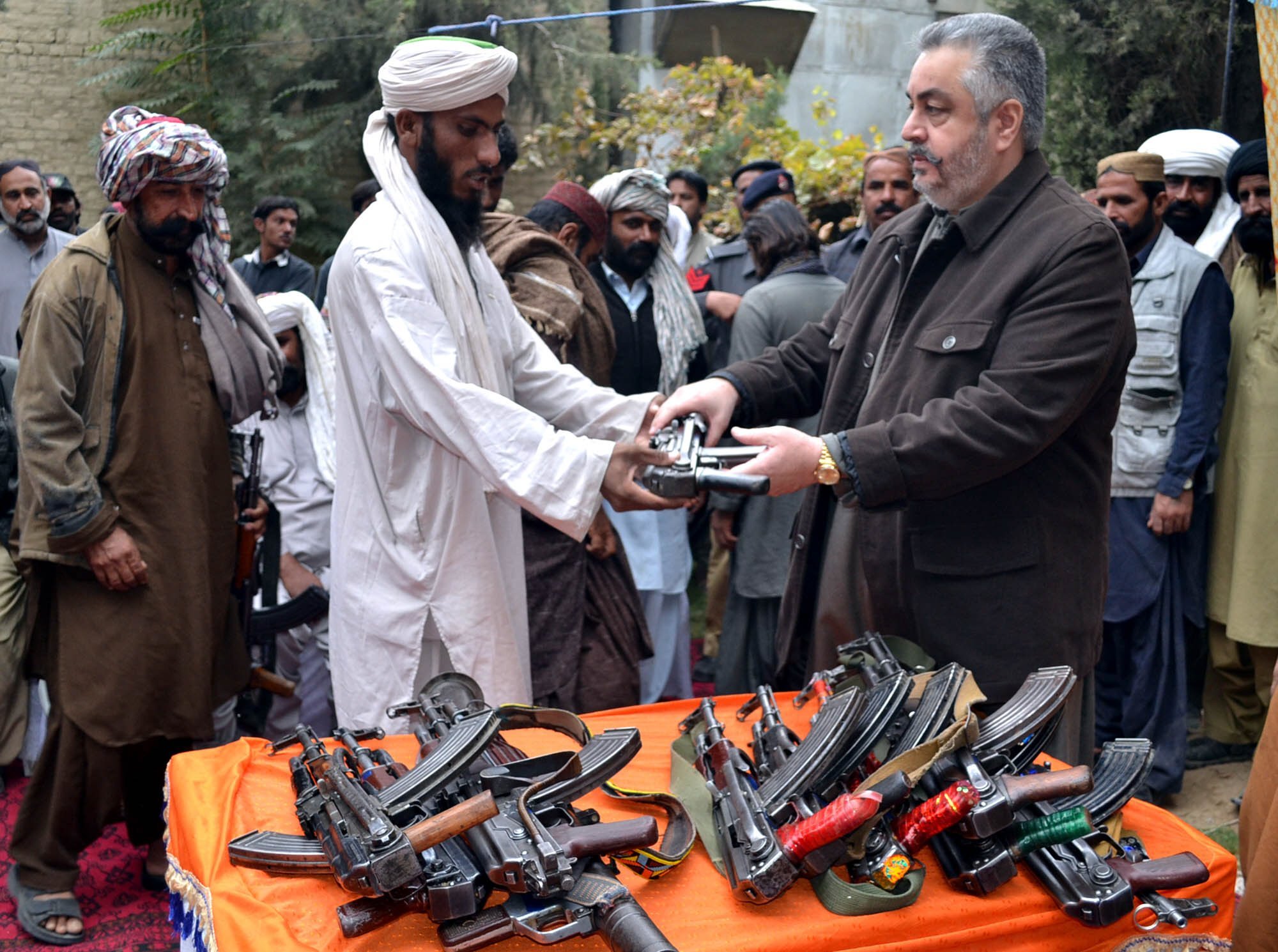 baloch militants lay down arms to marri tribal chief jangez marri on october 29 2015 photo banaras khan express