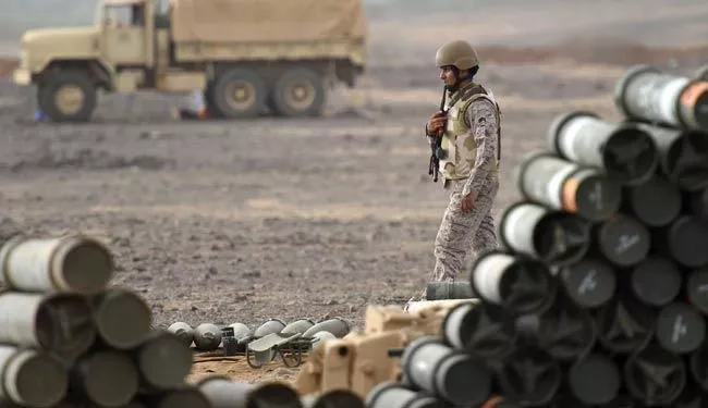 a saudi soldier from an artillery unit walks near ammunition at a position close to the saudi yemeni border in saudi arabia 039 s southwestern jizan region on april 13 2015 photo afp a saudi soldier from an artillery unit walks near ammunition at a position close to the saudi yemeni border in saudi arabia 039 s southwestern jizan region on april 13 2015 photo afp