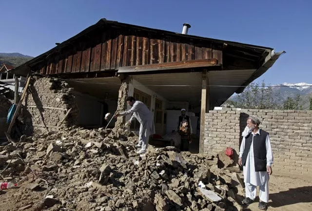 a man clears the rubble of the house of 50 year old herbal healer najib alam whose mud and stone house was damaged by the 7 5 magnitude quake in rehankot village in district dir on october 28 2015 photo reuters a man clears the rubble of the house of 50 year old herbal healer najib alam whose mud and stone house was damaged by the 7 5 magnitude quake in rehankot village in district dir on october 28 2015 photo reuters