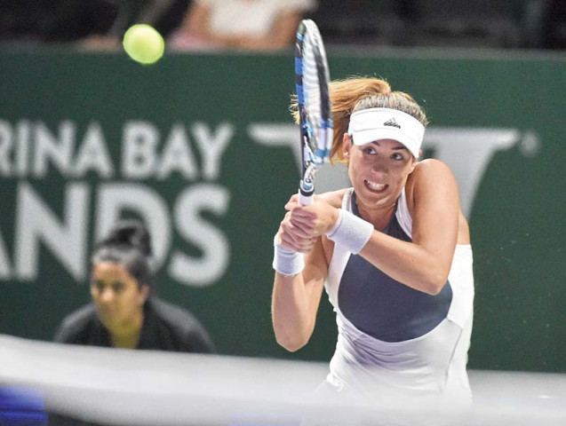muguruza is bracing herself for a very demanding saturday as she will also play the doubles semi final with compatriot carla suarez navarro photo afp muguruza is bracing herself for a very demanding saturday as she will also play the doubles semi final with compatriot carla suarez navarro photo afp