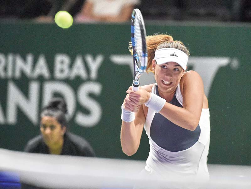 muguruza is bracing herself for a very demanding saturday as she will also play the doubles semi final with compatriot carla suarez navarro photo afp