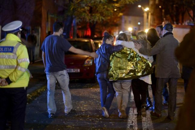 people walk outside a nightclub following an explosion in bucharest romania october 31 2015 photo reuters people walk outside a nightclub following an explosion in bucharest romania october 31 2015 photo reuters