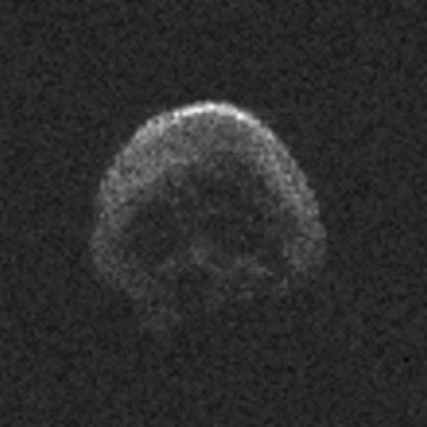 a massive space rock that will shave by earth on halloween looks like a dead comet with a skull face nasa says photo afp a massive space rock that will shave by earth on halloween looks like a dead comet with a skull face nasa says photo afp