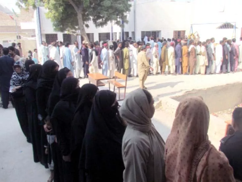people line up outside a polling station in government girl s primary school sukkur to cast their votes in the first phase of the lg elections that took place in eight districts of upper sindh on saturday photo naeem ahmed ghouri express people line up outside a polling station in government girl s primary school sukkur to cast their votes in the first phase of the lg elections that took place in eight districts of upper sindh on saturday photo naeem ahmed ghouri express