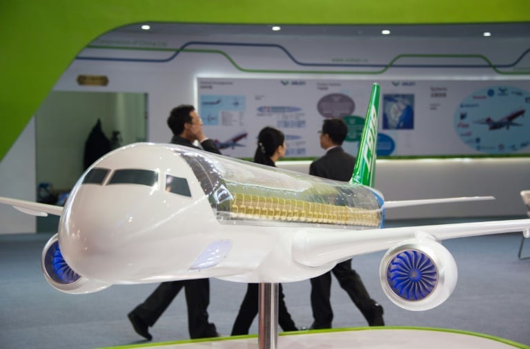 a model of comac 039 s commercial aircraft corp of china c919 passenger plane is seen on display at the airshow china in zhuhai photo afp