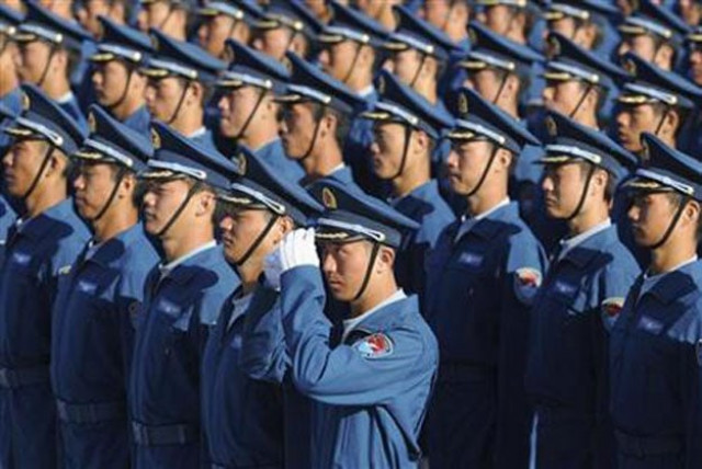 members of the chinese people 039 s liberation army pla air force aviation stand at attention during a training session at the 60th national day parade village in the outskirts of beijing september 15 2009 photo reuters members of the chinese people 039 s liberation army pla air force aviation stand at attention during a training session at the 60th national day parade village in the outskirts of beijing september 15 2009 photo reuters