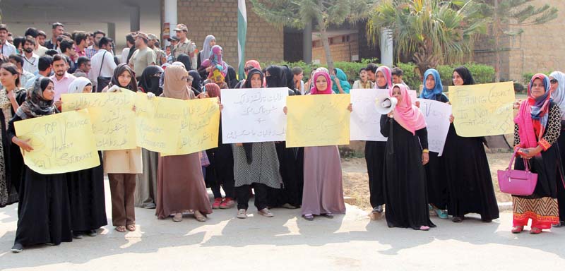 a group of girls participated in a cricket game at the university of karachi when a group of boys allegedly beat them up with bats the incident incited angry responses from fellow students who held a protest outside the administration block on monday photos aysha saleem express