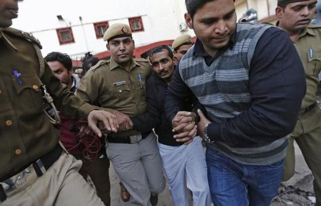 policemen escort driver shiv kumar yadav 3rd r in black jacket who is accused of a rape outside a court in new delhi december 8 2014 photo reuters policemen escort driver shiv kumar yadav 3rd r in black jacket who is accused of a rape outside a court in new delhi december 8 2014 photo reuters