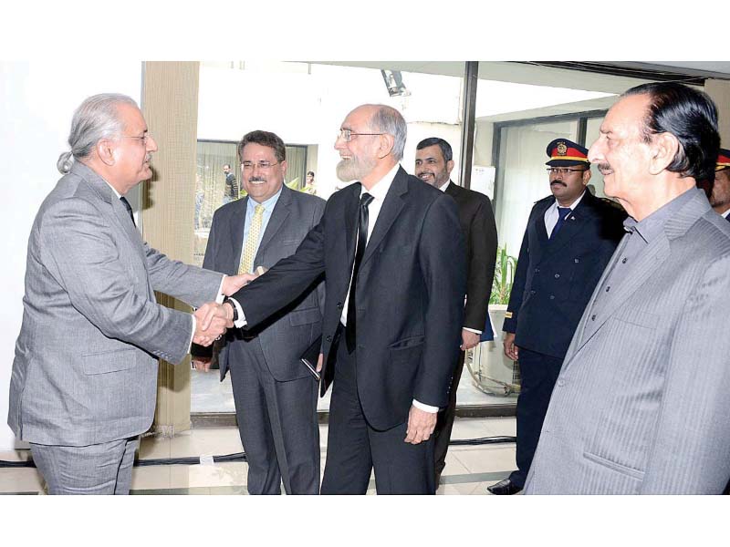 raza rabbani welcomes anwar zaheer jamali at the senate building photo app