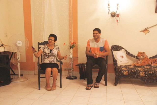 maria helena souza and her son lloyd souza sit in their 400 year old hous photos athar khan