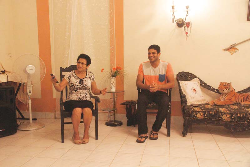 maria helena souza and her son lloyd souza sit in their 400 year old hous photos athar khan