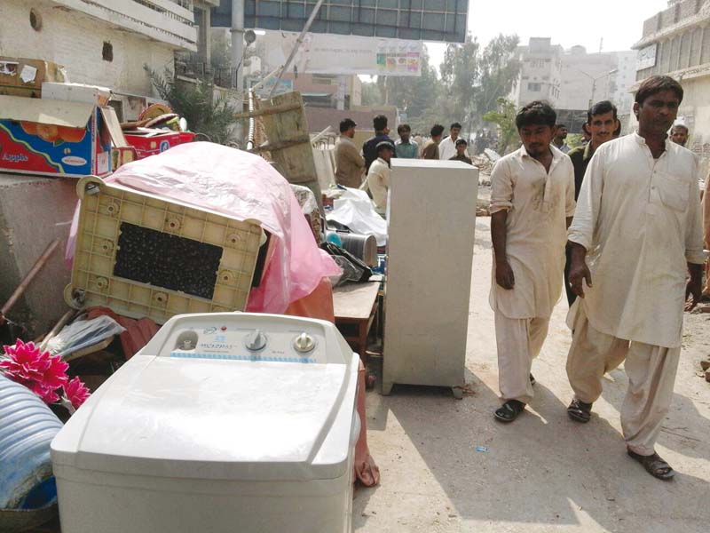 clashes ensued between the police and encroachers as the anti encroachment team of sukkur railways demolished the houses and shops illegally constructed on the railway land photo express