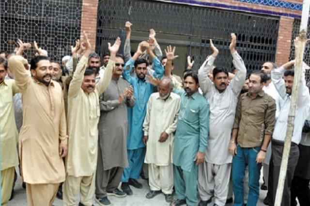 the demonstrators chanted slogans against hameed and demanded his suspension photo express the demonstrators chanted slogans against hameed and demanded his suspension photo express