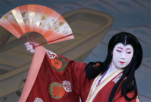 a geiko geisha performs during an annual spring dance performance at the kaburenjo theatre in the miyagawa district of kyoto japan april 11 2008 photo reuters