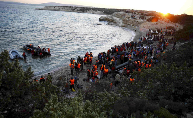 refugees gather at a beach to try to sail off for the greek island of chios from the western turkish coastal town of cesme in izmir province turkey on november 4 2015 photo reuters