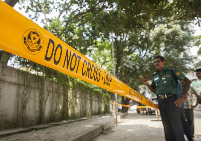 a group of unknown men stabbed a police officer to death on wednesday just outside the capital dhaka photo afp