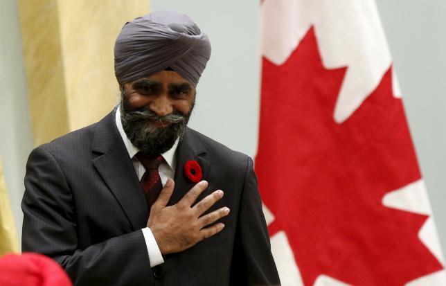 canada 039 s new national defence minister harjit sajjan gestures after being sworn in during a ceremony at rideau hall in ottawa canada november 4 2015 photo reuters