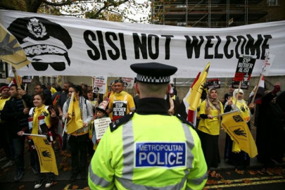 protests block downing street as egypt president visits uk