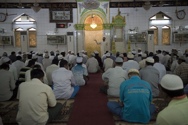 myanmar muslim worshipers listen to a speaker at a mosque in yangon on november 6 2015 photo afp
