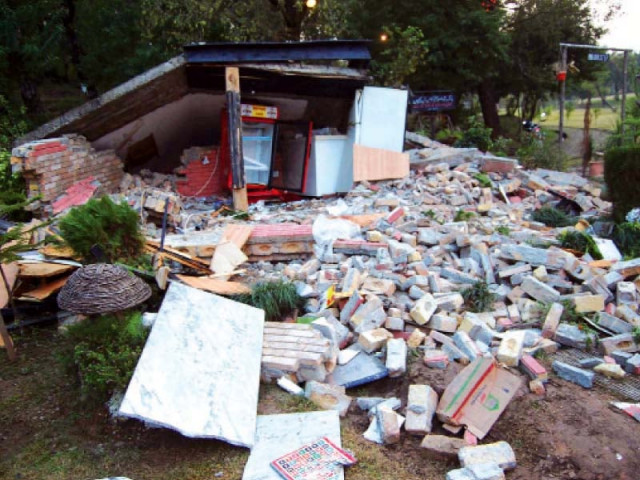hotspot s owner said a bulldozer accompanied by police tore down the much frequented kiosk photo muhammad javaid express hotspot s owner said a bulldozer accompanied by police tore down the much frequented kiosk photo muhammad javaid express