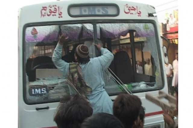 some of the protesters smashed the front screen of the bus in protest photo express some of the protesters smashed the front screen of the bus in protest photo express