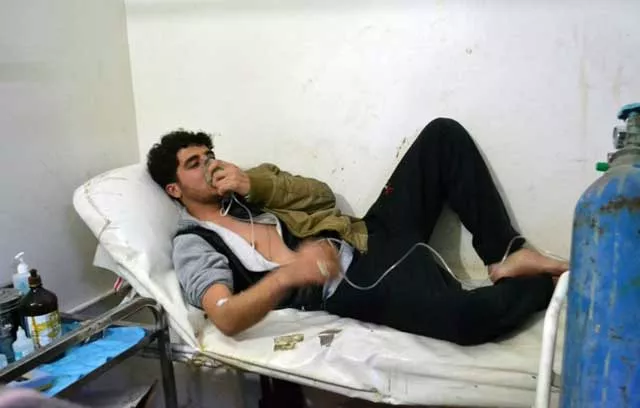 a syrian is given oxygen after a chemical weapon attack in idlib province on march 17 2015 photo afp a syrian is given oxygen after a chemical weapon attack in idlib province on march 17 2015 photo afp