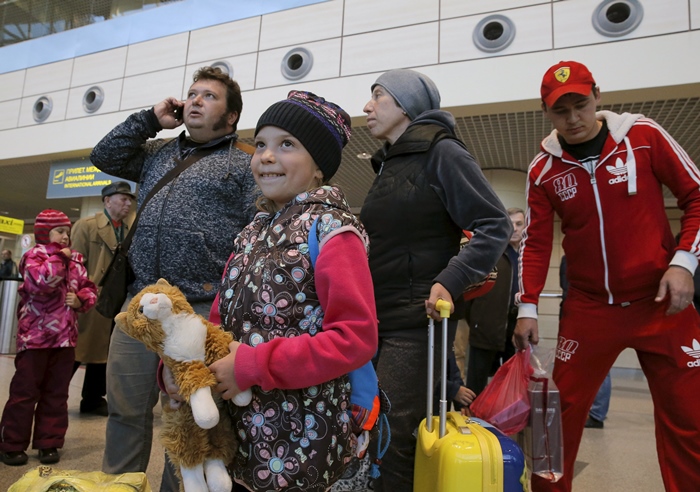 passengers of a flight from the egyptian resort of hurghada gather shortly after their arrival at domodedovo airport outside moscow russia november 7 2015 photo reuters