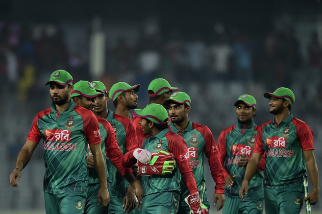 bangladesh cricketers walk off the field after winning the first odi match between bangladesh and zimbabwe at the sher e bangla national stadium in dhaka on november 7 2015 photo afp