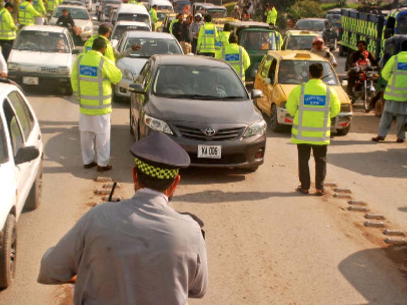 volunteers work with police to implement discipline on the road photo express