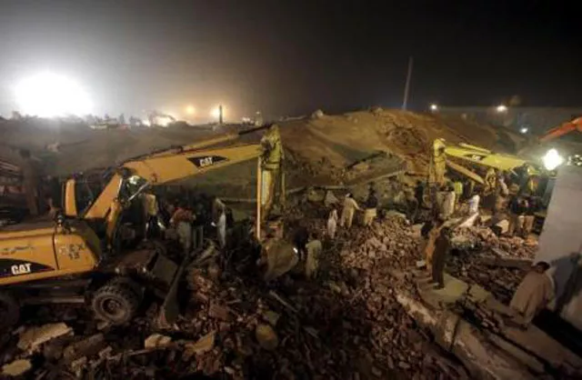 dco says 10 12 people still trapped under the rubble photo reuters dco says 10 12 people still trapped under the rubble photo reuters