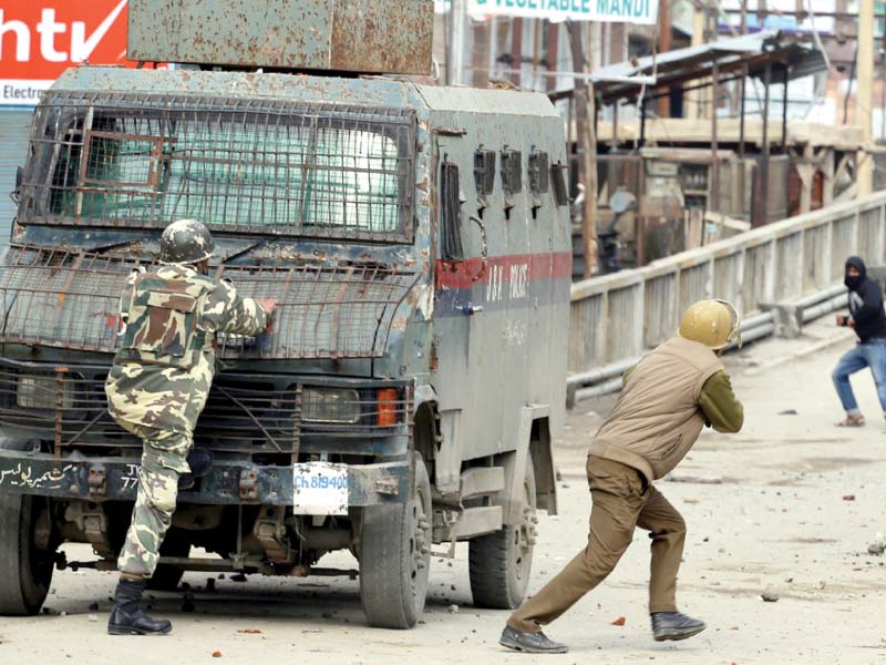 indian police clash with protesters in baramulla near srinagar photo afp