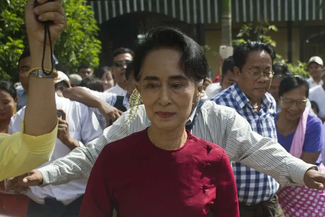 myanmar opposition leader and head of the national league for democracy nld aung san suu kyi c visits a polling station in kawhmu township yangon on november 8 2015 photo afp myanmar opposition leader and head of the national league for democracy nld aung san suu kyi c visits a polling station in kawhmu township yangon on november 8 2015 photo afp