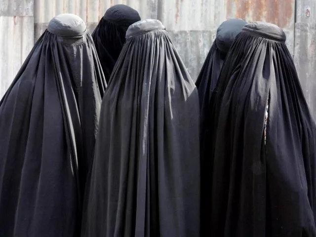 locals alerted police after noticing that a burqa clad 039 woman 039 talking on the phone was wearing men 039 s shoes photo reuters file locals alerted police after noticing that a burqa clad 039 woman 039 talking on the phone was wearing men 039 s shoes photo reuters file