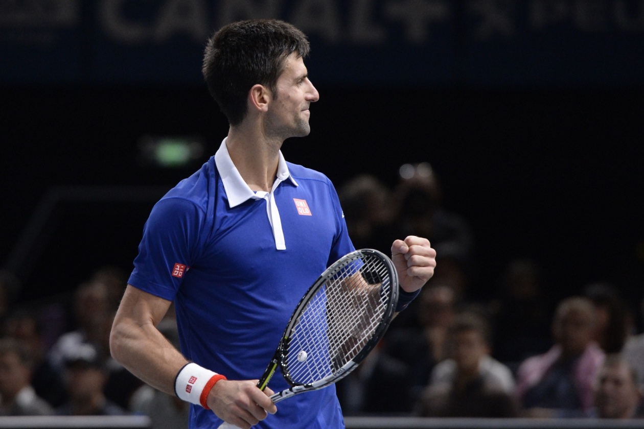 serbia 039 s novak djokovic celebrates after winning the final tennis match against britain 039 s andy murray at the atp world tour masters 1000 indoor tennis tournament in paris on november 8 2015 photo afp