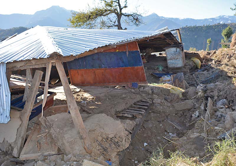 damaged houses resulting from earthquake in alpurai photo express