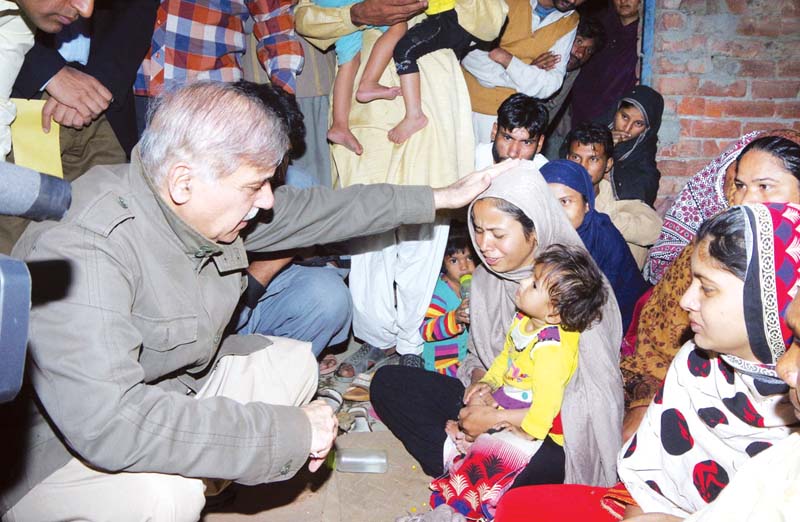 chief minister shahbaz sharif condoles with the family of a deceased factory worker photo inp