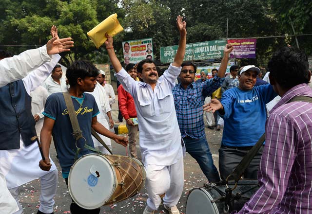 indian janta dal united activists and supporters celebrate after a victory by an alliance led by their party in new delhi on november 8 2015 in the bihar state assembly elections photo afp