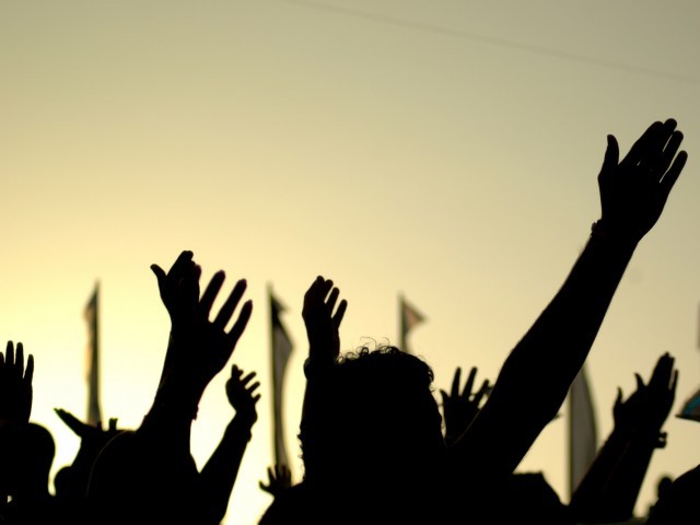 scores of protesters carried banners and placards and shouted slogans against the dha administration photo file