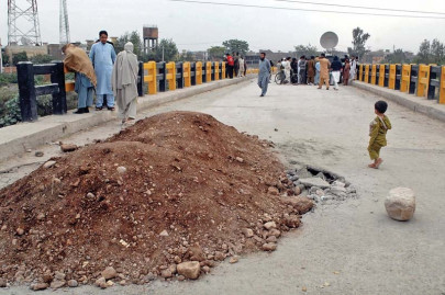 watch your head overloaded truck damages bridge watch your head overloaded truck damages bridge