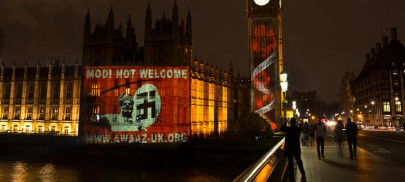 giant projection reading modi not welcome displayed on british parliament