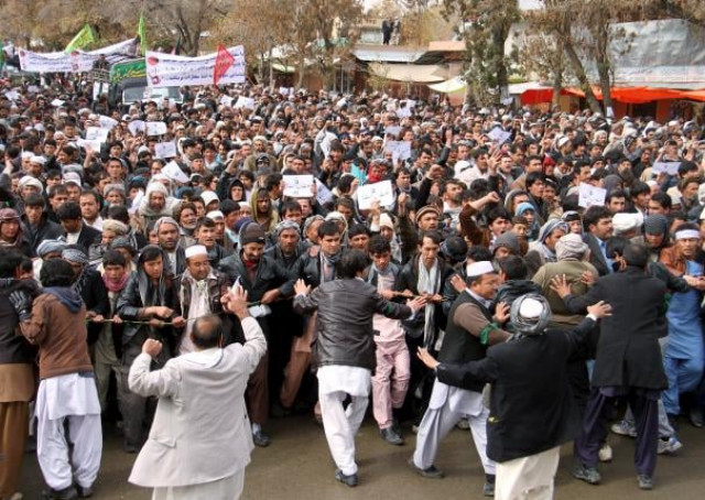 afghan men protest to condemn the killing of seven hazara ethnic minority that were kidnapped and killed by islamic state militants in ghazni province afghanistan november 10 2015 photo reuters afghan men protest to condemn the killing of seven hazara ethnic minority that were kidnapped and killed by islamic state militants in ghazni province afghanistan november 10 2015 photo reuters