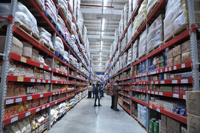a file picture taken on september 26 2012 shows indian shoppers browsing through the products of a newly opened bharti wal mart best price modern wholesale store in hyderabad photo afp a file picture taken on september 26 2012 shows indian shoppers browsing through the products of a newly opened bharti wal mart best price modern wholesale store in hyderabad photo afp