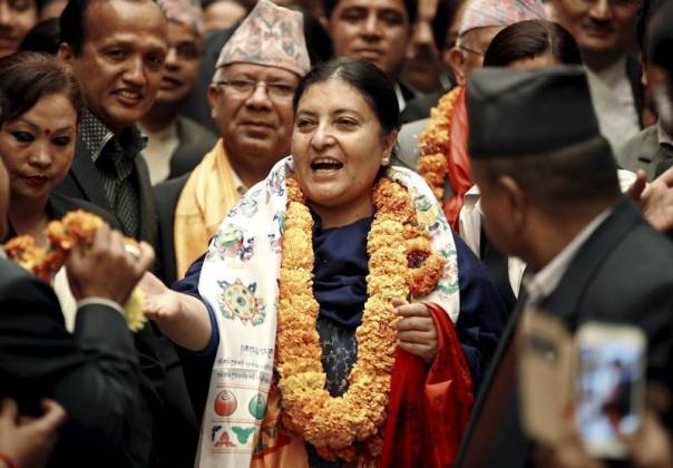 nepal 039 s newly elected president bidhya bhandari c walks out from the parliament after she was elected to power in kathmandu nepal october 28 2015 bhandari is nepal 039 s first woman president photo reuters