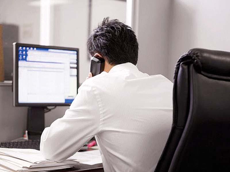 people with desk jobs should spend some time standing or walking photo file