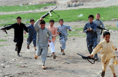 say no to weapons children destroy toy guns in protest say no to weapons children destroy toy guns in protest